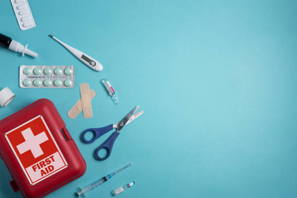 istock Home first aid kit on a blue background. The elements of the first aid kit 1464217166