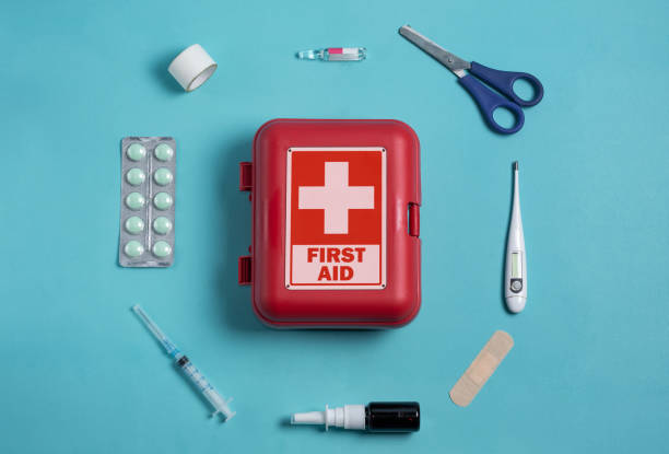istock Home first aid kit on a blue background. The elements of the first aid kit 1464217178