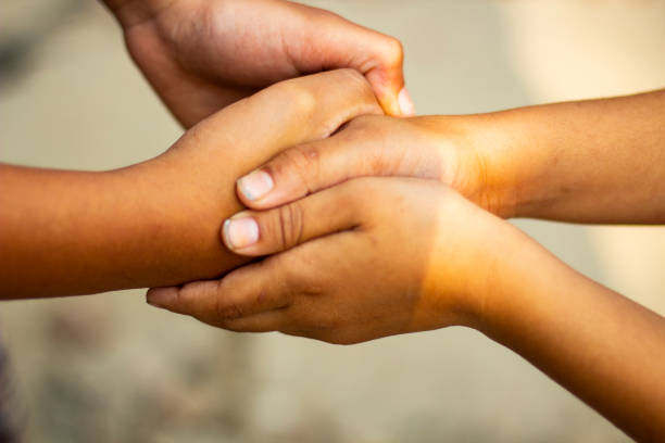 istock Many hands are joined together to work and the background is blurred 1464223421