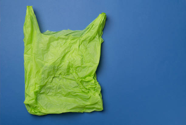 istock Disposable plastic bag on color background, top view 1464225854