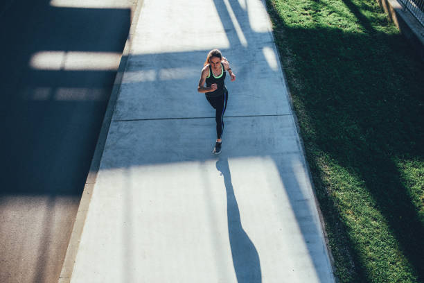 istock Sportswoman running 1464228045
