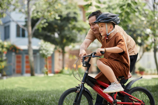 istock Riding Bicycle with Grandson 1464230051
