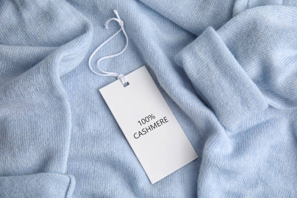 istock Warm light blue cashmere sweater with label, closeup 1464236776