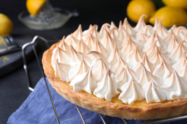 istock Delicious lemon meringue pie on table, closeup 1464237327