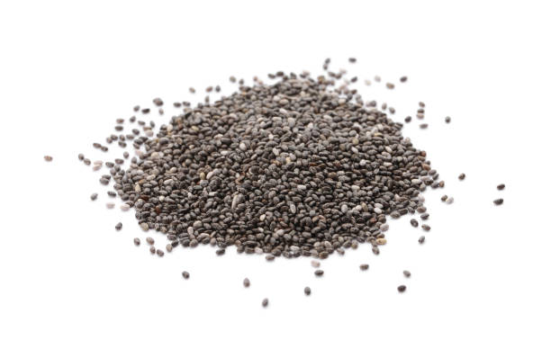 istock Pile of chia seeds on white background 1464237647