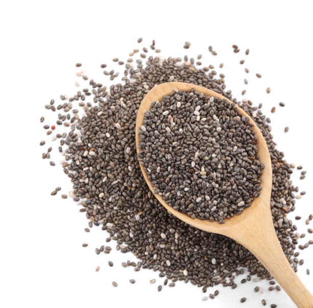 istock Wooden spoon with chia seeds on white background, top view 1464238261