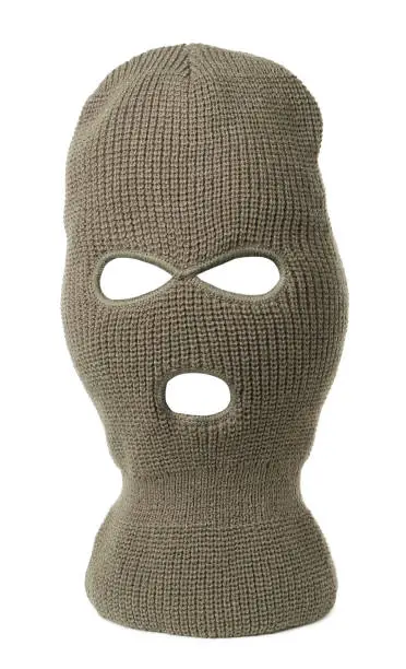 Beige knitted balaclava isolated on white. Cloth headwear