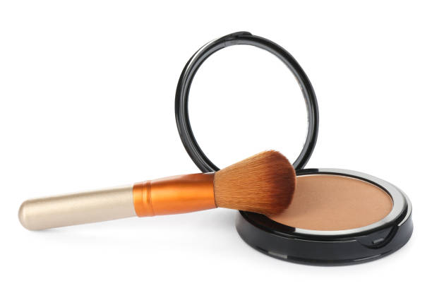istock Face powder with brush on white background. Makeup product 1464240317