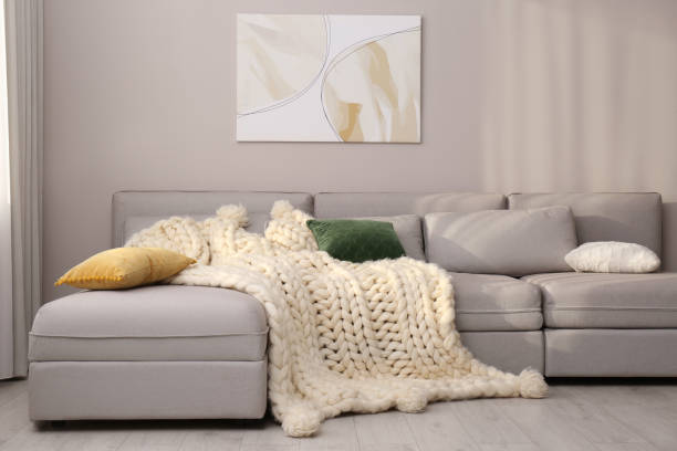 istock Living room interior with knitted merino wool blanket on sofa 1464240641