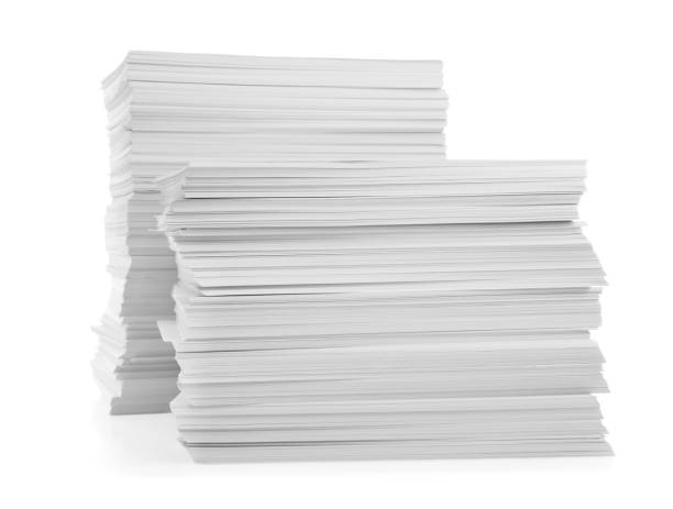 istock Stacks of paper sheets isolated on white 1464241741