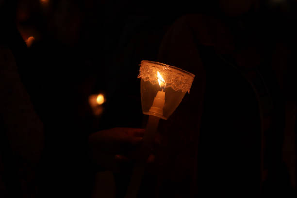 istock Candles in the dark during a lookout tour. 1464245910