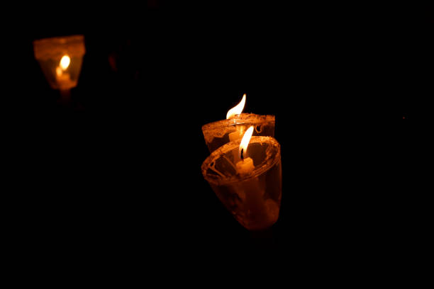 istock Candles in the dark during a lookout tour. 1464245937