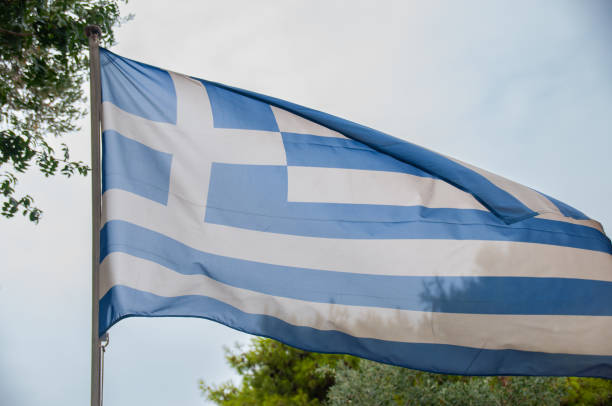 istock The Greek flag blowing in the wind 1464246158
