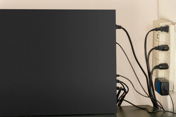 Side of Desktop Computer With Cables And Reverse Copyspace stock photo