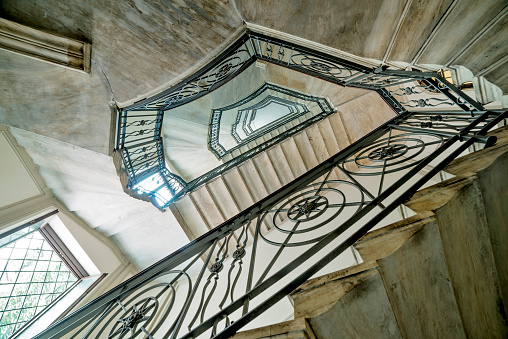 Perspective view of stairwell in Italian noble palace