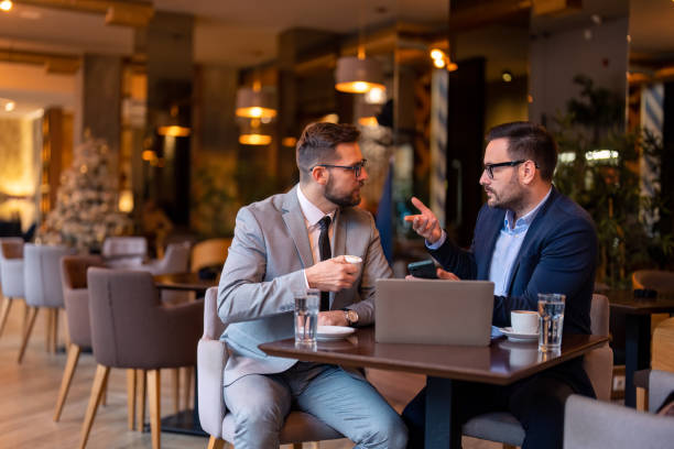 istock Successful CEO executive managers on meeting in restaurant 1464250440