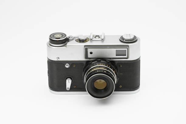 istock Old vintage film camera isolated on white backgorund. 1464250594
