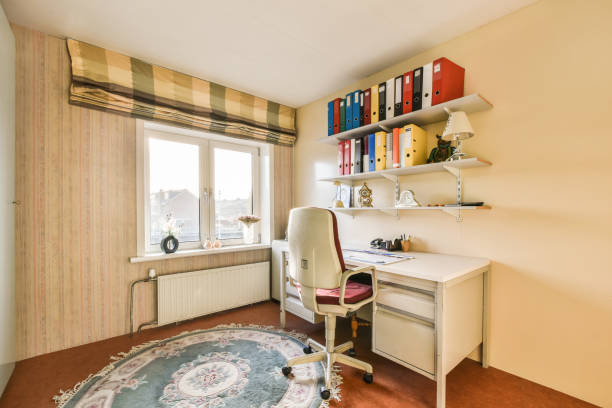 istock a home office with a desk and a window 1464252274