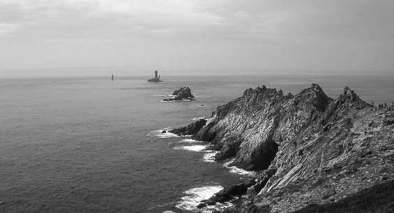 Panoramic view of La Pointe du Raz, the lighthouse of the Vieille and the island of Sein (Finistère - France) in Brittany.