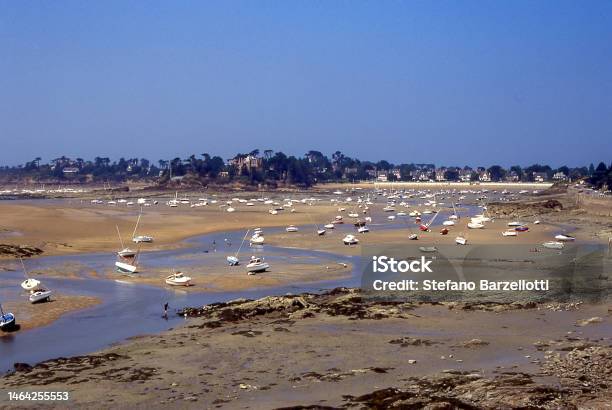 Boats Ashore At Low Tide Inbrittany Stock Photo - Download Image Now - Nautical Vessel, Stranded, 1990-1999