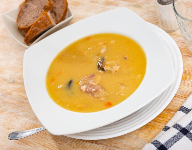 istock Hot pea soup with smoked meats and vegetables 1464255679