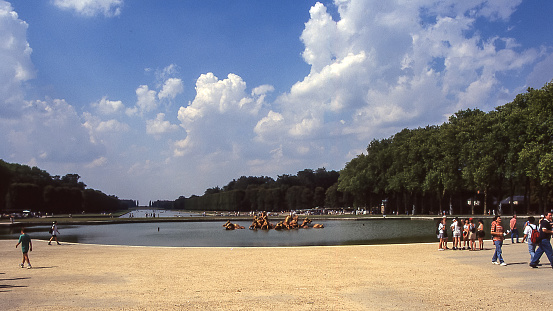 Versailles, Pais, France - aug 14, 1997: view of the basin of the Apollo fountain in the vast gardens of the Palace of Versailles