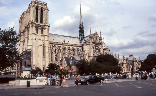 Paris, France - aug 19, 1997: view of the gothic Notre-Dame de Paris cathedral, with its gargoyles and characteristic flying buttresses.