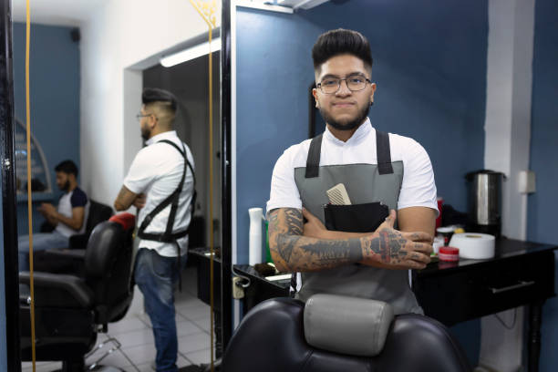 istock Portrait of a barber looking at the camera 1464258563