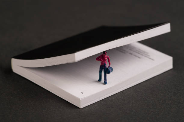 Book with figurine of men model