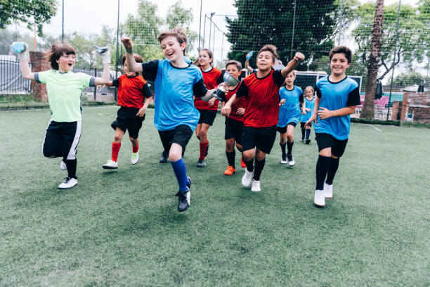 istock Young players team celebrating a success 1464270699