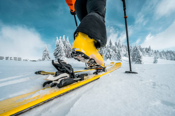 istock Close up on a boot and a ski during ski touring adventure 1464276455
