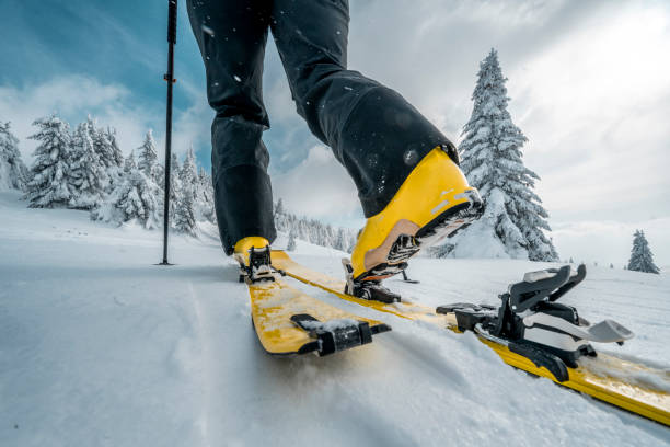istock Close up on a boot and a ski during ski touring adventure 1464276597
