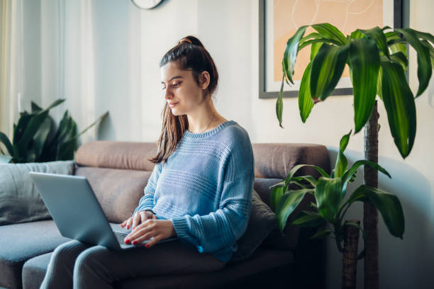 istock Woman at home using laptop. 1464283227
