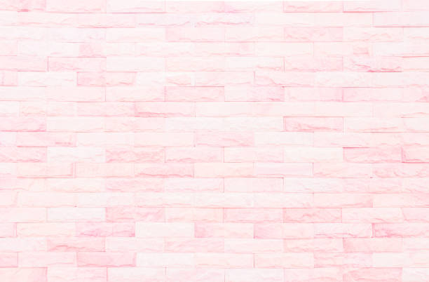 istock Empty Pink brick wall texture background in the bedroom at lovely. Brickwork stonework interior, rock old clean concrete grid uneven abstract weathered brick design, horizontal architecture wallpaper. 1464283362