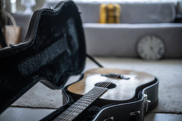 istock Guitar at home for relaxation. 1464284615