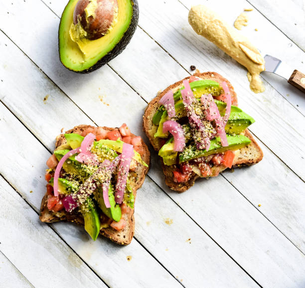 A great balanced, healthy breakfast. Hummus, onions, avocado and hemp seeds.