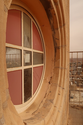 Window on top of the bell tower of the St John the Baptist Church in Madaba, Jordan 2021
