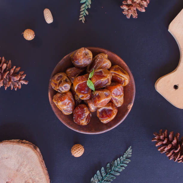 istock Delicious Date Fruit in a bowl. Bowl of dried dates. 1464302075