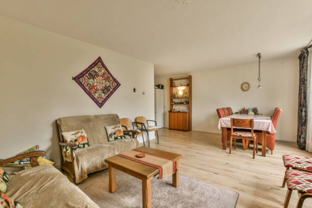 istock a living room with a couch and a dining table 1464309251