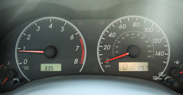istock Car speedometer in sunlight with gas showing 1464311109