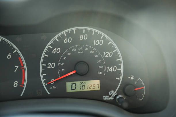 istock Car speedometer in sunlight with gas showing 1464311110