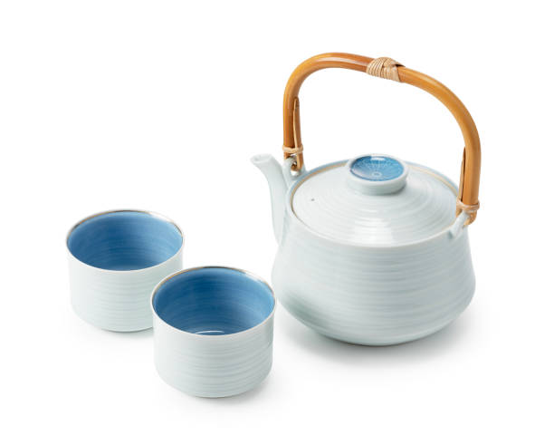 istock Japanese teacups and teapots placed against a white background. 1464312080