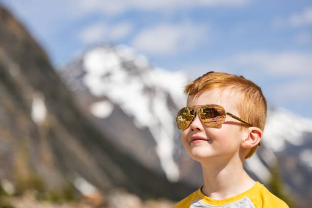 Happy Young Redhead Boy Portrait at Mount Edith Cavell, Jasper, Canada