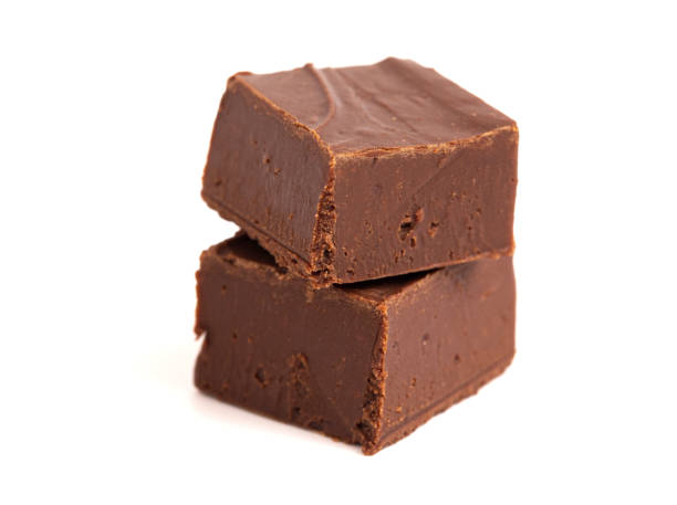 Plain Chocolate Fudge in 1 Inch Cubes Pieces of Plain Chocolate Fudge in 1 Inch Cubes fudge stock pictures, royalty-free photos & images