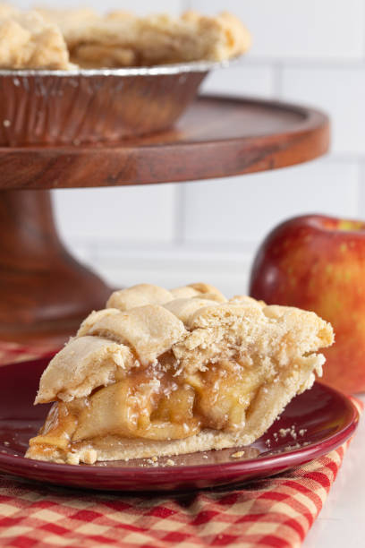 istock Handmade Apple Pie with a Lattice Top Crust on a Kitchen Counter 1464318719