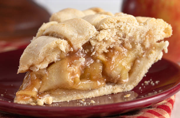 istock Handmade Apple Pie with a Lattice Top Crust on a Kitchen Counter 1464318732