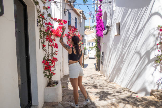 istock Young woman visiting a town in Spain, summer 1464319036