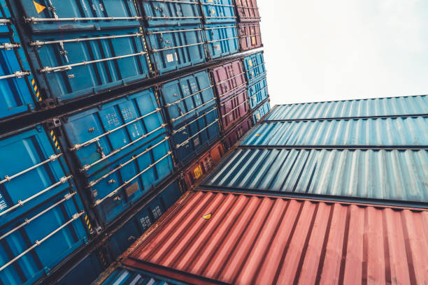 istock Cargo container for overseas shipping on high stack look up from ground . Logistics supply chain management and international goods export concept . 1464323043