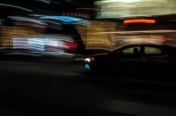 istock CAR AT NIGHT IN MOTION BLUR 1464327855