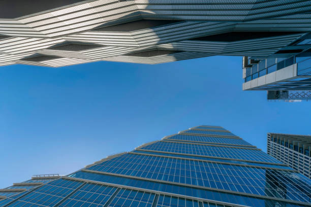 istock Austin, Texas- Two modern high-rise buildings in a low angle view 1464330041